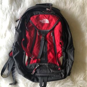 The North Face Surge Backpack in Red and Grey